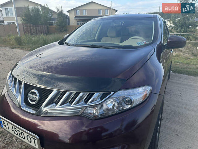 Красный Ниссан Мурано, объемом двигателя 3.5 л и пробегом 129 тыс. км за 9900 $, фото 1 на Automoto.ua