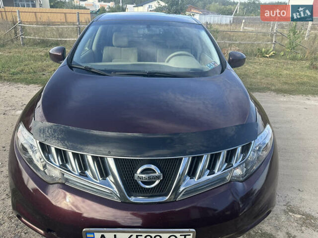 Красный Ниссан Мурано, объемом двигателя 3.5 л и пробегом 129 тыс. км за 9900 $, фото 5 на Automoto.ua