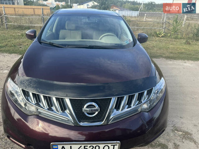 Красный Ниссан Мурано, объемом двигателя 3.5 л и пробегом 129 тыс. км за 9900 $, фото 4 на Automoto.ua