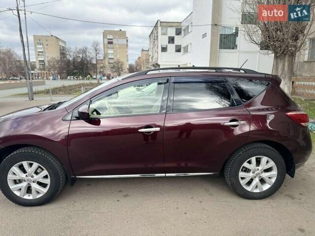Красный Ниссан Мурано, объемом двигателя 3.5 л и пробегом 219 тыс. км за 9999 $, фото 7 на Automoto.ua