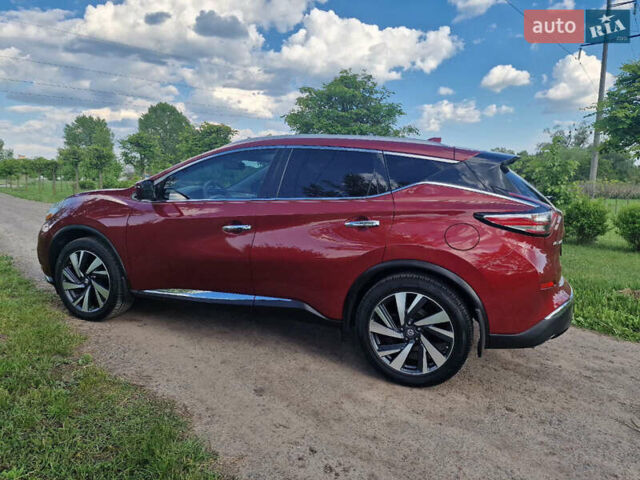 Красный Ниссан Мурано, объемом двигателя 3.5 л и пробегом 190 тыс. км за 18000 $, фото 4 на Automoto.ua