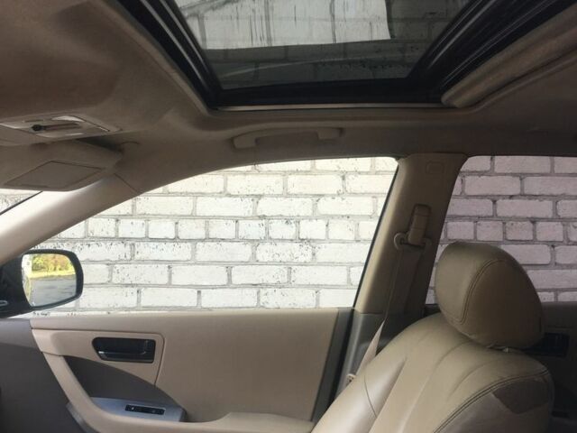 Серый Ниссан Мурано, объемом двигателя 3.5 л и пробегом 250 тыс. км за 4500 $, фото 2 на Automoto.ua