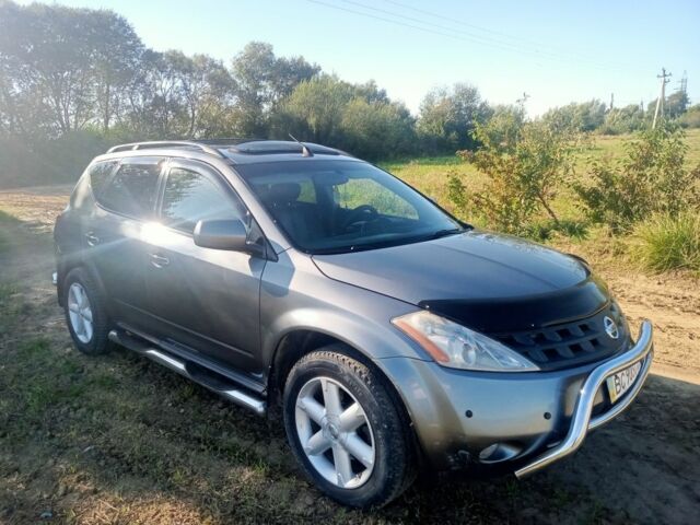 Серый Ниссан Мурано, объемом двигателя 3.5 л и пробегом 248 тыс. км за 4700 $, фото 1 на Automoto.ua