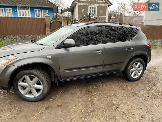 Серый Ниссан Мурано, объемом двигателя 3.5 л и пробегом 257 тыс. км за 5700 $, фото 1 на Automoto.ua