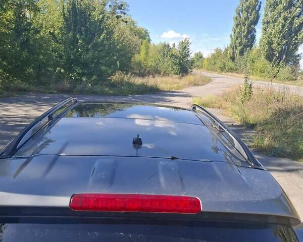 Серый Ниссан Мурано, объемом двигателя 2.49 л и пробегом 263 тыс. км за 12500 $, фото 3 на Automoto.ua