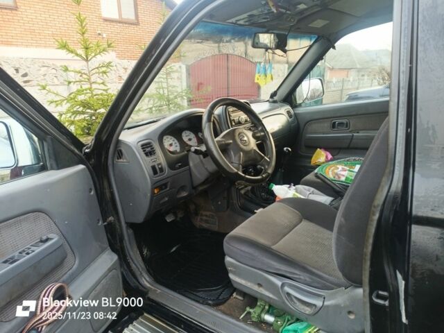 Чорний Ніссан НП, об'ємом двигуна 2 л та пробігом 420 тис. км за 5500 $, фото 6 на Automoto.ua