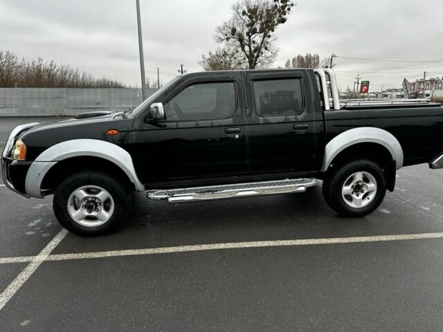 Чорний Ніссан НП, об'ємом двигуна 2.4 л та пробігом 330 тис. км за 12500 $, фото 3 на Automoto.ua