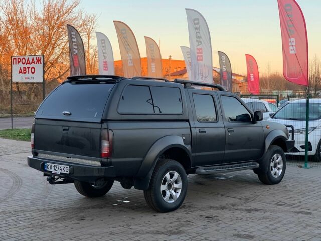 Черный Ниссан НП, объемом двигателя 2.5 л и пробегом 220 тыс. км за 14999 $, фото 4 на Automoto.ua