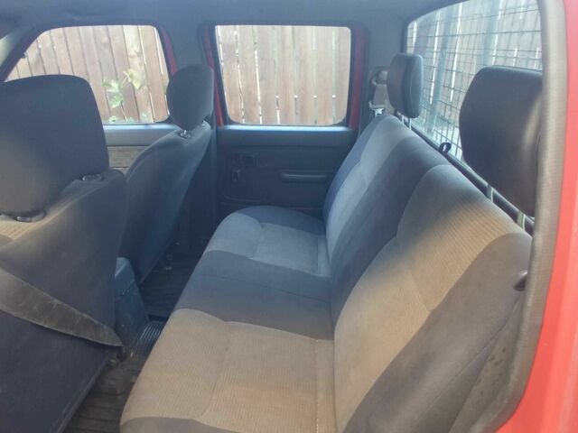 Красный Ниссан НП, объемом двигателя 2.5 л и пробегом 286 тыс. км за 4985 $, фото 11 на Automoto.ua