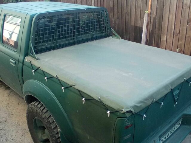 Красный Ниссан НП, объемом двигателя 2.5 л и пробегом 286 тыс. км за 4985 $, фото 4 на Automoto.ua