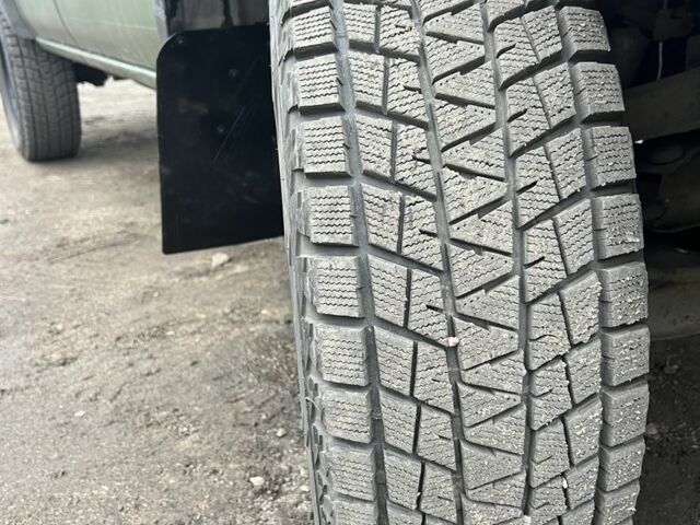 Зелений Ніссан НП, об'ємом двигуна 2.5 л та пробігом 200 тис. км за 8700 $, фото 2 на Automoto.ua