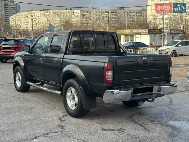 Черный Ниссан НП300, объемом двигателя 2.49 л и пробегом 299 тыс. км за 8750 $, фото 3 на Automoto.ua