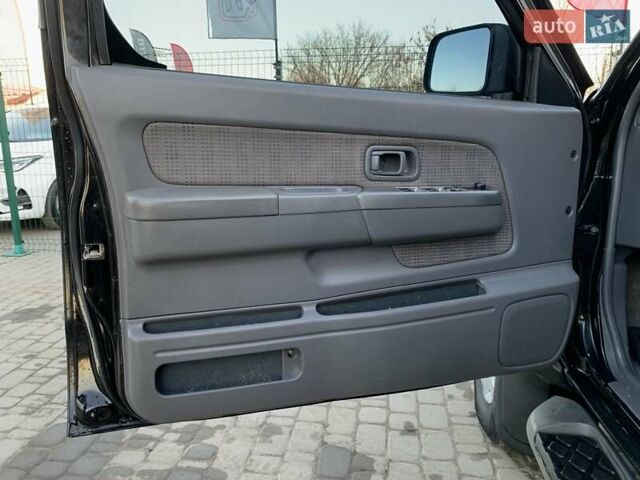 Чорний Ніссан НП300, об'ємом двигуна 2.5 л та пробігом 220 тис. км за 14999 $, фото 22 на Automoto.ua
