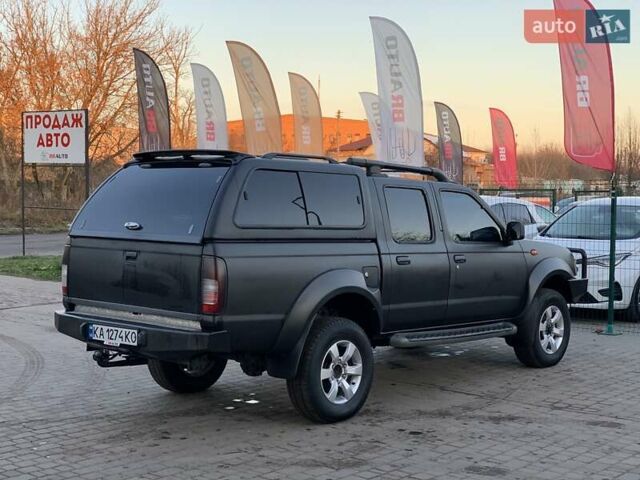 Чорний Ніссан НП300, об'ємом двигуна 2.5 л та пробігом 220 тис. км за 14999 $, фото 12 на Automoto.ua