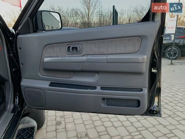 Чорний Ніссан НП300, об'ємом двигуна 2.5 л та пробігом 220 тис. км за 14999 $, фото 30 на Automoto.ua