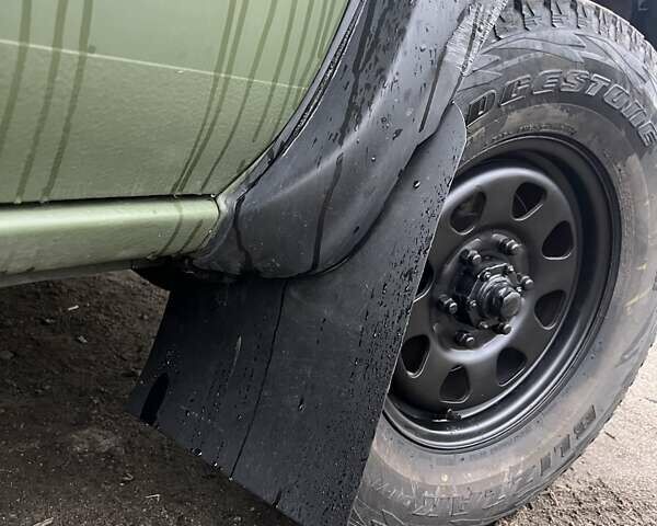 Зелений Ніссан НП300, об'ємом двигуна 2.49 л та пробігом 200 тис. км за 8700 $, фото 15 на Automoto.ua