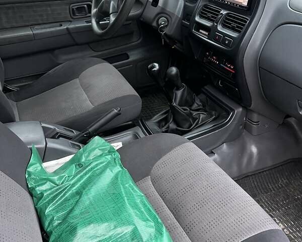 Зелений Ніссан НП300, об'ємом двигуна 2.49 л та пробігом 200 тис. км за 8700 $, фото 12 на Automoto.ua