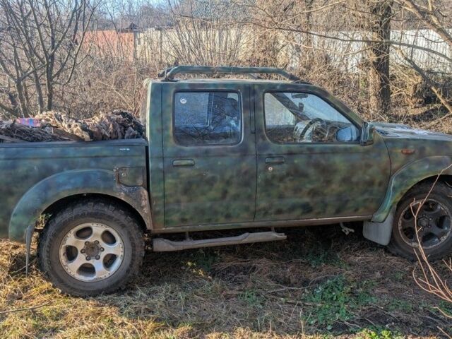 Белый Ниссан Навара, объемом двигателя 2.5 л и пробегом 300 тыс. км за 3700 $, фото 1 на Automoto.ua