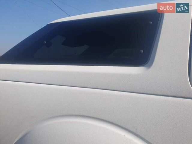 Білий Ніссан Навара, об'ємом двигуна 2.49 л та пробігом 417 тис. км за 13300 $, фото 15 на Automoto.ua