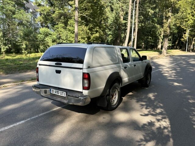 Белый Ниссан Навара, объемом двигателя 2.5 л и пробегом 123 тыс. км за 6800 $, фото 5 на Automoto.ua