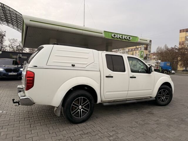 Белый Ниссан Навара, объемом двигателя 2.5 л и пробегом 280 тыс. км за 7350 $, фото 7 на Automoto.ua
