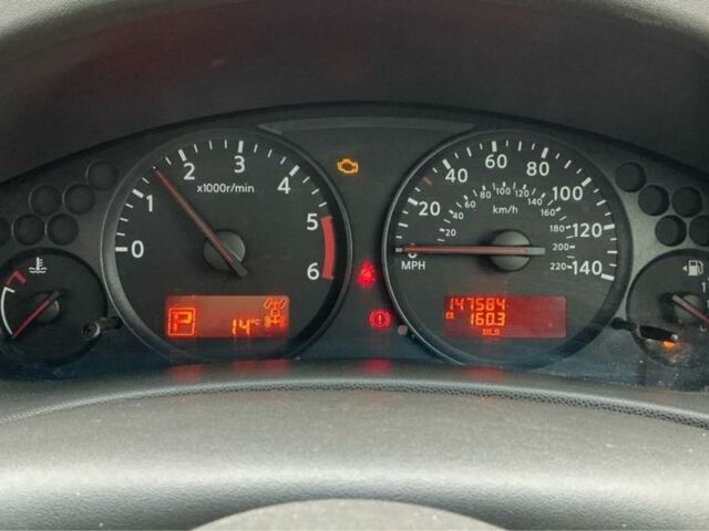 Белый Ниссан Навара, объемом двигателя 2.5 л и пробегом 240 тыс. км за 4500 $, фото 7 на Automoto.ua