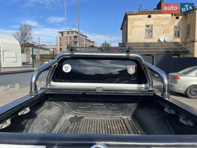 Ниссан Навара 2012 в Львове на Automoto.ua Белый Ниссан Навара, объемом двигателя 2.5 л и пробегом 212 тыс. км за 16000 $, фото 5 на Automoto.ua