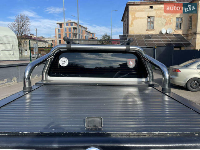 Ниссан Навара 2012 в Львове на Automoto.ua Белый Ниссан Навара, объемом двигателя 2.5 л и пробегом 212 тыс. км за 16000 $, фото 6 на Automoto.ua