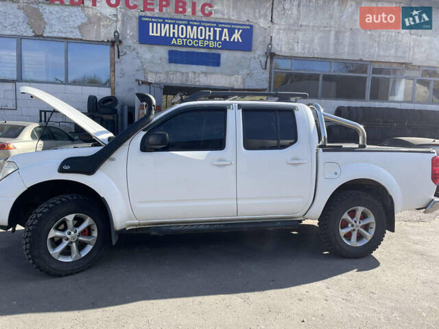 Ниссан Навара 2012 в Львове на Automoto.ua Белый Ниссан Навара, объемом двигателя 2.5 л и пробегом 212 тыс. км за 16000 $, фото 2 на Automoto.ua