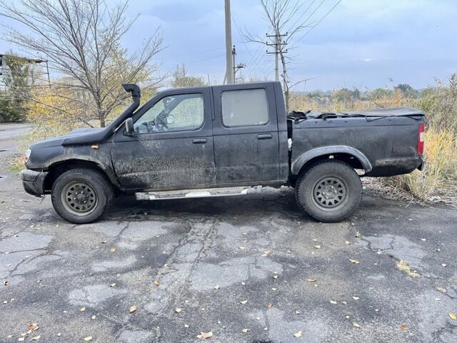 Черный Ниссан Навара, объемом двигателя 2.5 л и пробегом 165 тыс. км за 3622 $, фото 4 на Automoto.ua