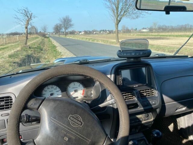 Чорний Ніссан Навара, об'ємом двигуна 2.5 л та пробігом 234 тис. км за 2680 $, фото 4 на Automoto.ua