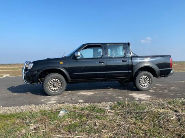 Чорний Ніссан Навара, об'ємом двигуна 2.5 л та пробігом 234 тис. км за 2680 $, фото 6 на Automoto.ua