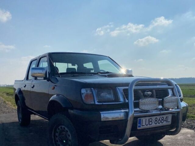 Чорний Ніссан Навара, об'ємом двигуна 2.5 л та пробігом 234 тис. км за 2680 $, фото 1 на Automoto.ua