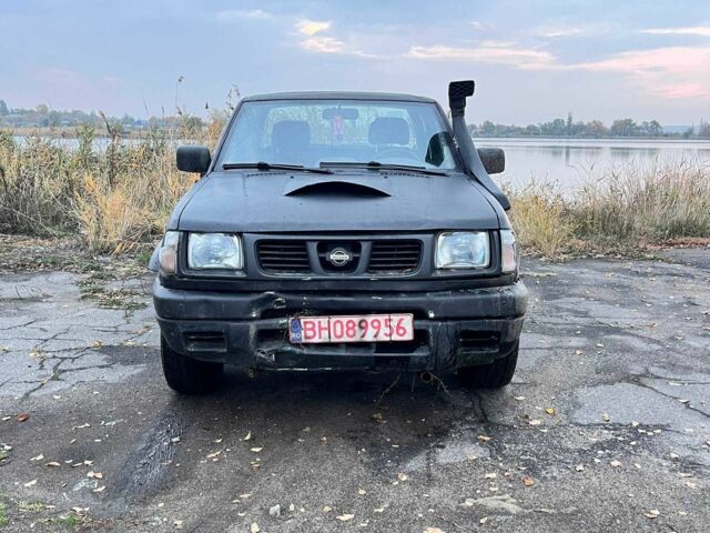 Черный Ниссан Навара, объемом двигателя 2.5 л и пробегом 400 тыс. км за 3338 $, фото 4 на Automoto.ua