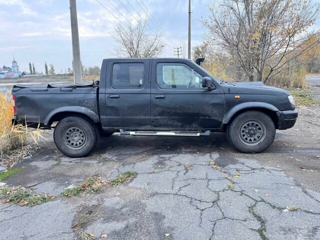 Черный Ниссан Навара, объемом двигателя 2.5 л и пробегом 400 тыс. км за 3338 $, фото 5 на Automoto.ua