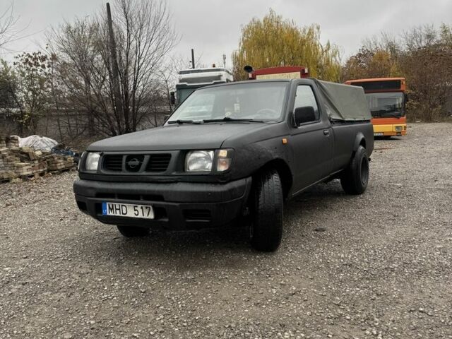 Черный Ниссан Навара, объемом двигателя 2.5 л и пробегом 1000 тыс. км за 3300 $, фото 2 на Automoto.ua