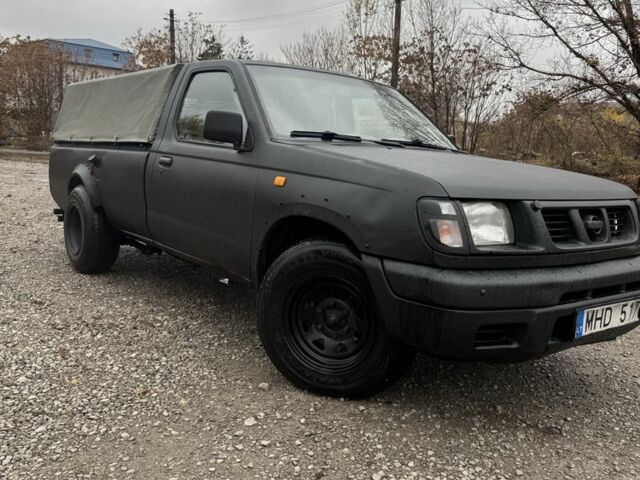 Черный Ниссан Навара, объемом двигателя 2.5 л и пробегом 1000 тыс. км за 3300 $, фото 6 на Automoto.ua