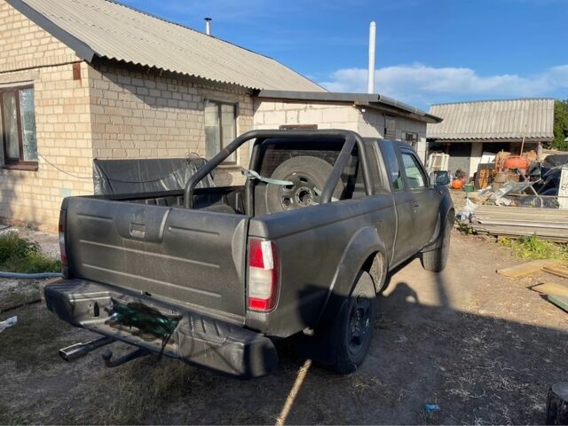 Чорний Ніссан Навара, об'ємом двигуна 2.5 л та пробігом 300 тис. км за 4500 $, фото 2 на Automoto.ua