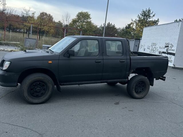 Чорний Ніссан Навара, об'ємом двигуна 2.5 л та пробігом 433 тис. км за 3999 $, фото 1 на Automoto.ua