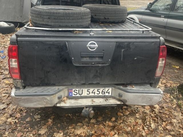 Черный Ниссан Навара, объемом двигателя 2.5 л и пробегом 200 тыс. км за 4000 $, фото 2 на Automoto.ua