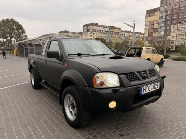 Черный Ниссан Навара, объемом двигателя 2.5 л и пробегом 200 тыс. км за 4750 $, фото 1 на Automoto.ua