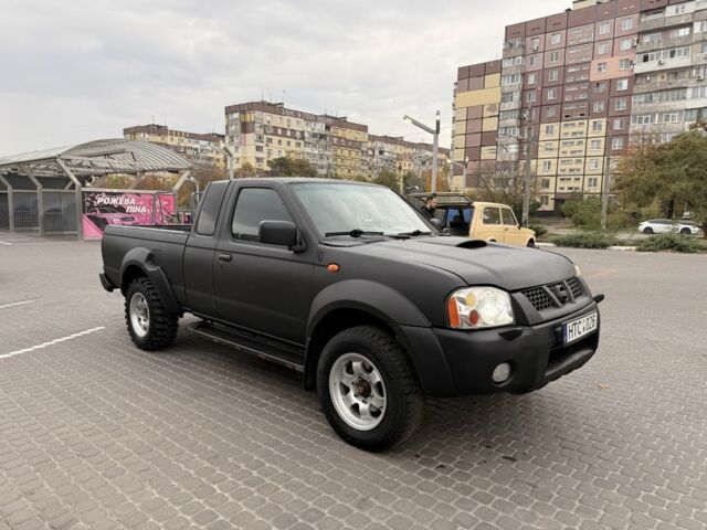 Черный Ниссан Навара, объемом двигателя 2.5 л и пробегом 200 тыс. км за 4750 $, фото 5 на Automoto.ua