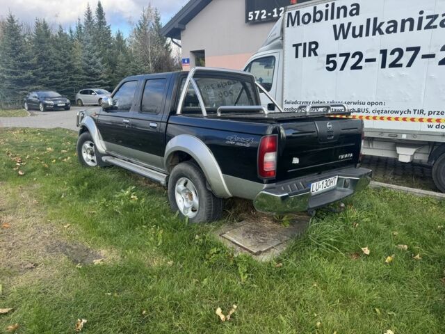 Чорний Ніссан Навара, об'ємом двигуна 2.7 л та пробігом 168 тис. км за 3000 $, фото 2 на Automoto.ua