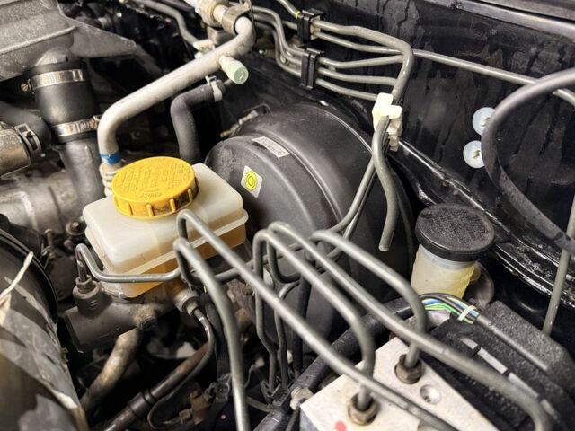 Черный Ниссан Навара, объемом двигателя 2.5 л и пробегом 200 тыс. км за 4750 $, фото 17 на Automoto.ua