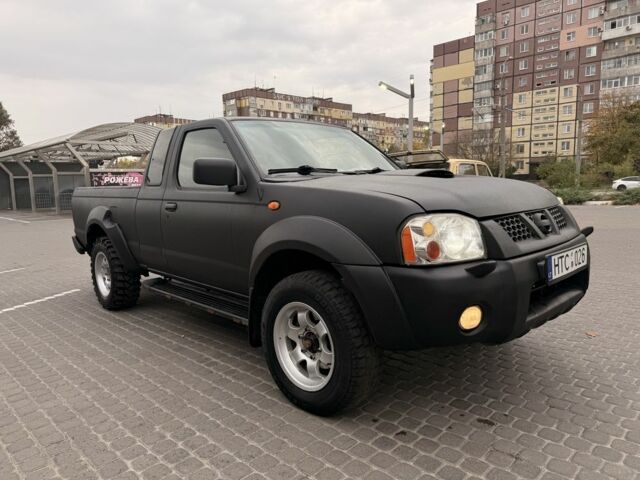 Черный Ниссан Навара, объемом двигателя 2.5 л и пробегом 200 тыс. км за 4750 $, фото 3 на Automoto.ua