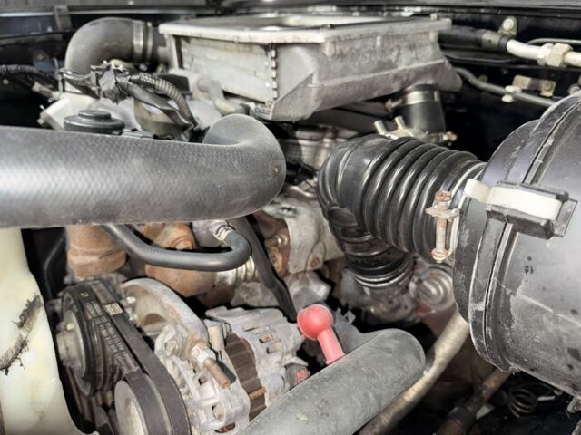 Черный Ниссан Навара, объемом двигателя 2.5 л и пробегом 200 тыс. км за 4750 $, фото 19 на Automoto.ua