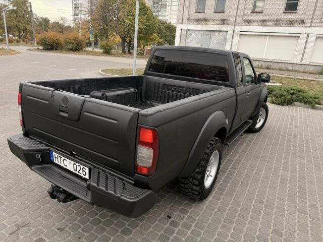 Черный Ниссан Навара, объемом двигателя 2.5 л и пробегом 200 тыс. км за 4750 $, фото 7 на Automoto.ua
