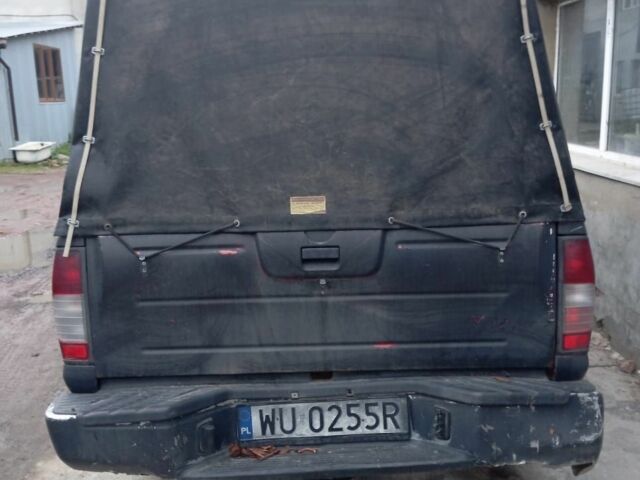 Черный Ниссан Навара, объемом двигателя 0 л и пробегом 280 тыс. км за 2697 $, фото 4 на Automoto.ua