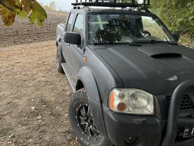 Чорний Ніссан Навара, об'ємом двигуна 2.5 л та пробігом 330 тис. км за 4500 $, фото 6 на Automoto.ua