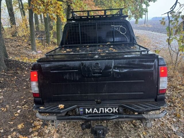 Чорний Ніссан Навара, об'ємом двигуна 2.5 л та пробігом 330 тис. км за 4500 $, фото 9 на Automoto.ua